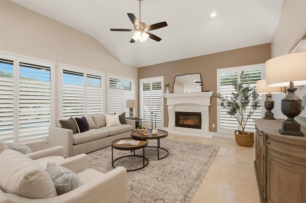 1120 Twin Oaks Drive, Prosper, TX 75078 Everyone loves a comfortable, expansive family room ~ large enough for many furniture placement options for the family & friends to gather. Its focal point is the stone-encased gas log fireplace.