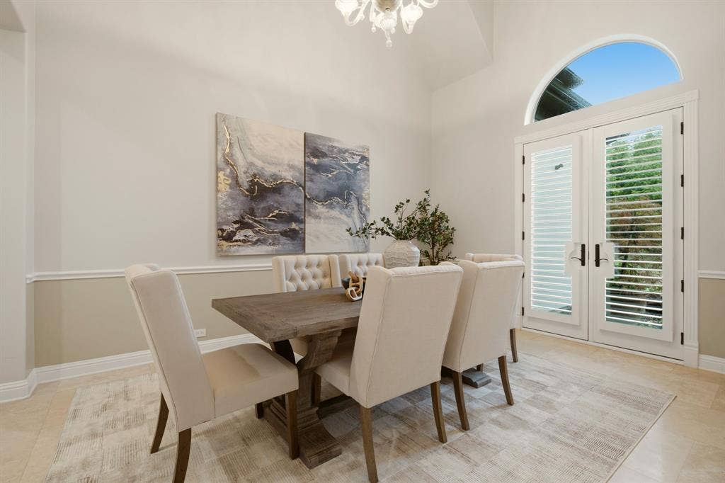 1120 Twin Oaks Drive, Prosper, TX 75078 Understated elegance for holiday gatherings with family & friends. French doors open directly to the front gardens.