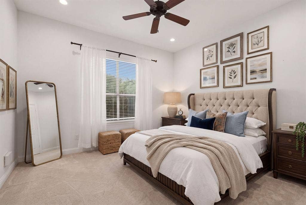 1120 Twin Oaks Drive, Prosper, TX 75078 Bedroom 2 faces the back of the home, adjacent full bath to the left. Plush carpet & walk-in closets in each of the secondary bedrooms.