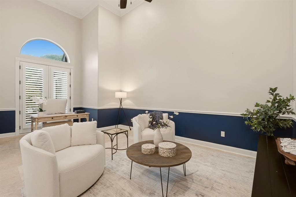 1120 Twin Oaks Drive, Prosper, TX 75078 Dramatic high ceilings, fresh paint & another set of French doors .... this living room offers a clean, modern aesthetic for multiple uses. Consider using this space as a study &/or a media room.