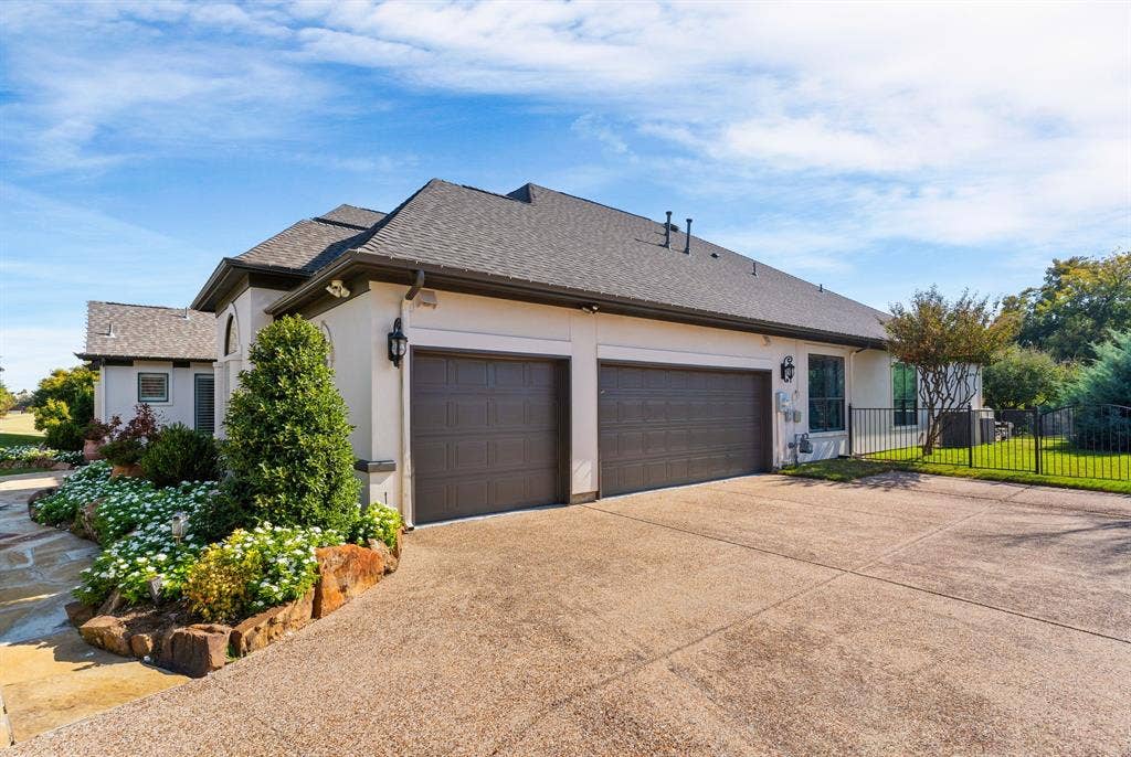 1120 Twin Oaks Drive, Prosper, TX 75078 Oversized 3-car garage compliments the wide driveway for additional parking ~ for yourself &/or guests.