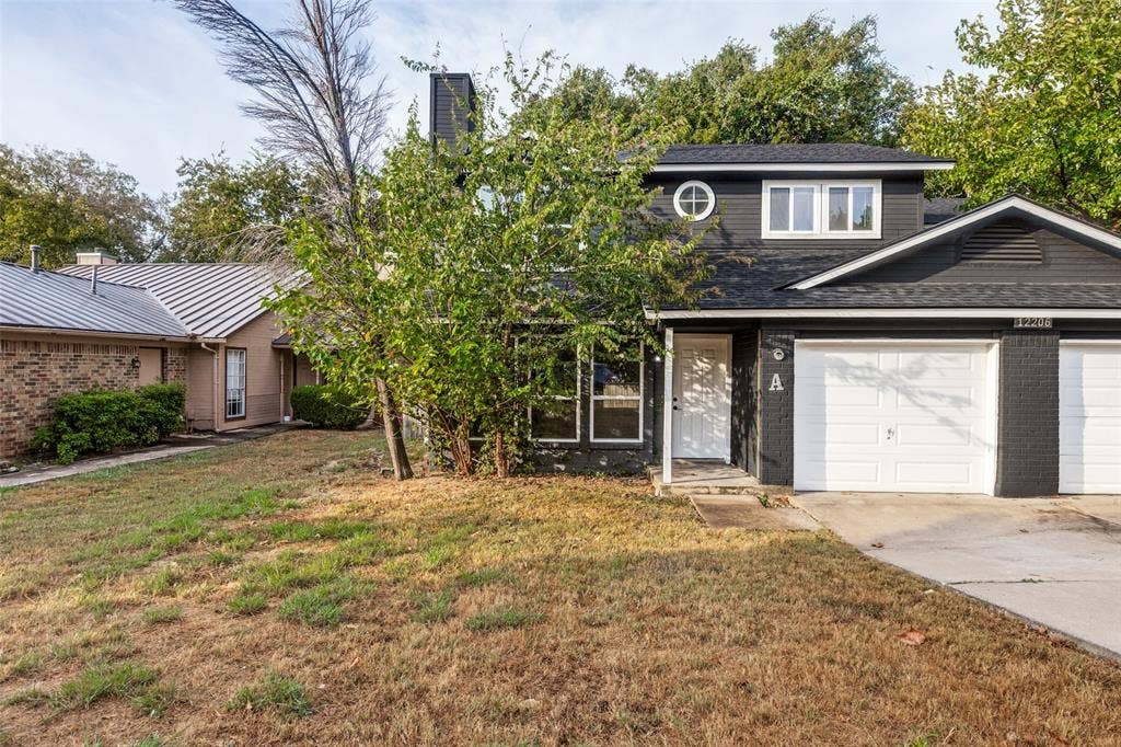 12206 Tyson Cove, #A, Austin, TX 78758 Charcoal brick and siding exterior with white trim
