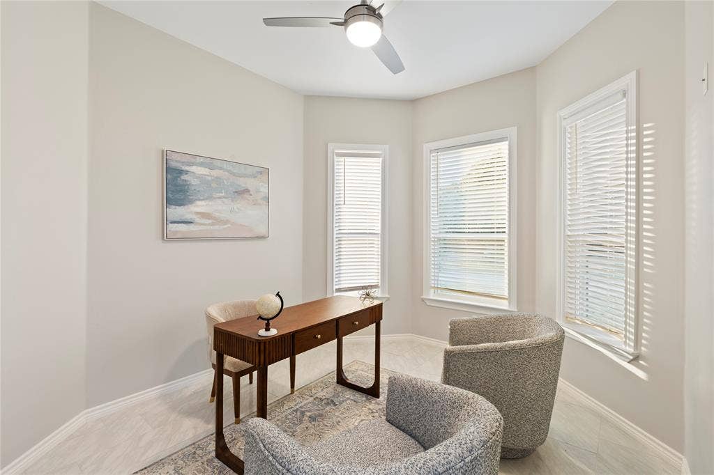 702 Linkcrest Drive, Duncanville, TX 75137 Recessed lighting, ceiling fan, multiple windows with blinds, light wood-finish flooring, and light-toned walls
