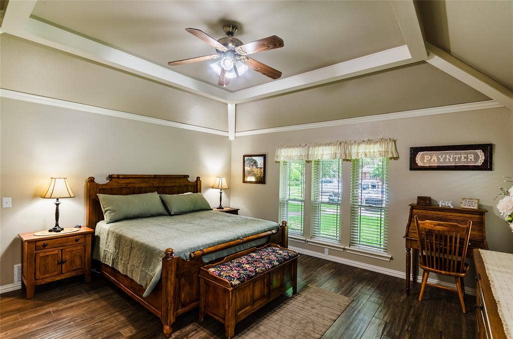 4009 Wilshire Court, Plano, TX 75023 Vaulted ceiling featuring white ceiling beams and a central ceiling fan with integrated lighting