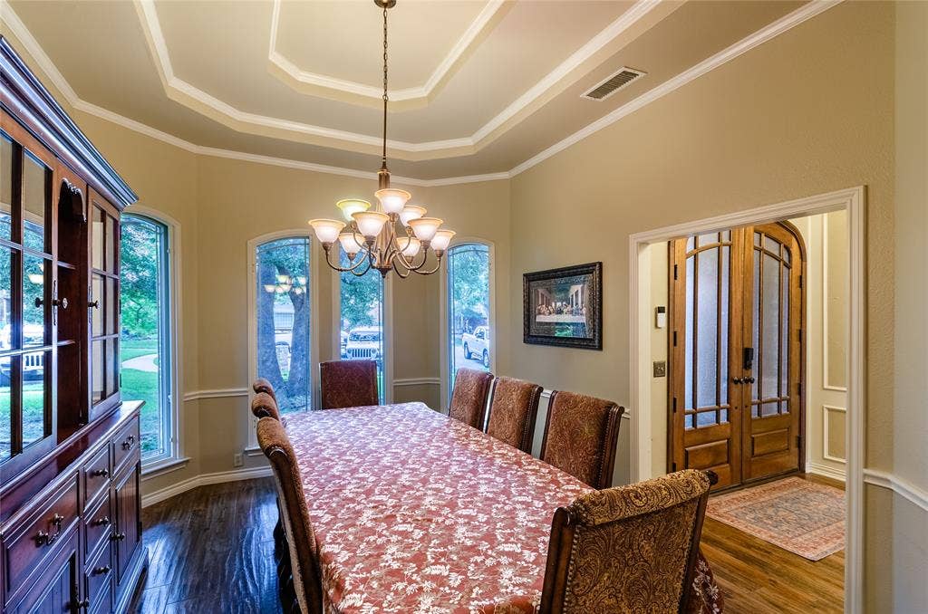 4009 Wilshire Court, Plano, TX 75023 Formal dining room with dark wood-finish flooring