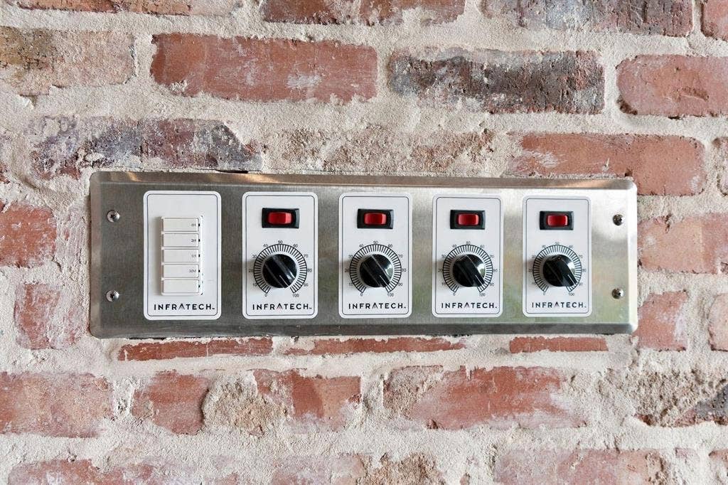 3368 Dorado Beach Drive, Farmers Branch, TX 75234 Brick wall texture with a stainless steel control panel