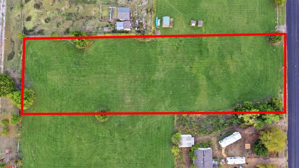 000 CR-760, Nevada, TX 75173 Expansive rectangular lot featuring a verdant grass expanse and scattered mature trees