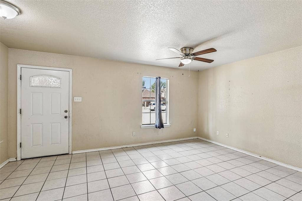 3100 Hale Avenue, #101 & 102, Fort Worth, TX 76106 Unit 101 living room with durable tile flooring
