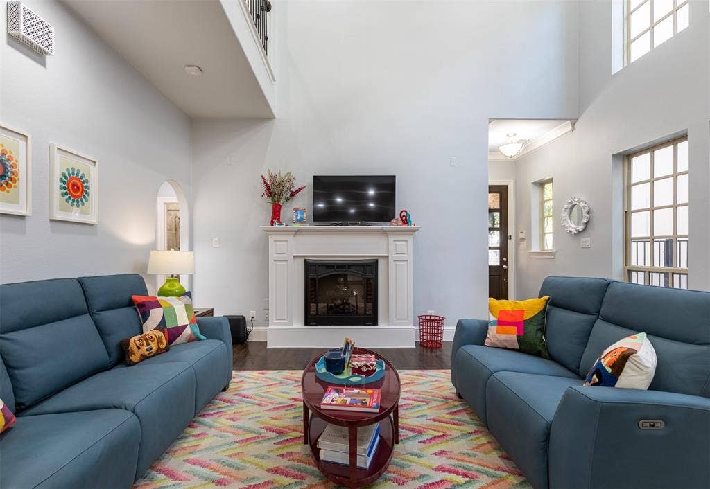 Living room room with fireplace.
