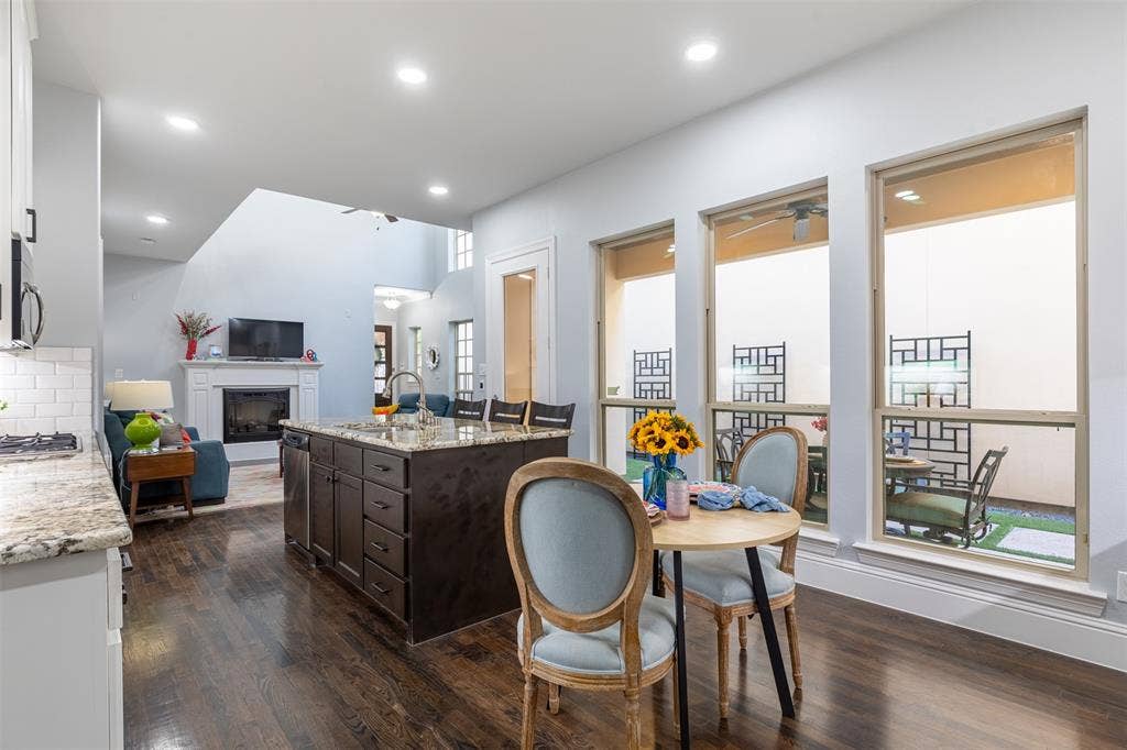 Breakfast area flows nicely to kitchen and living area.
