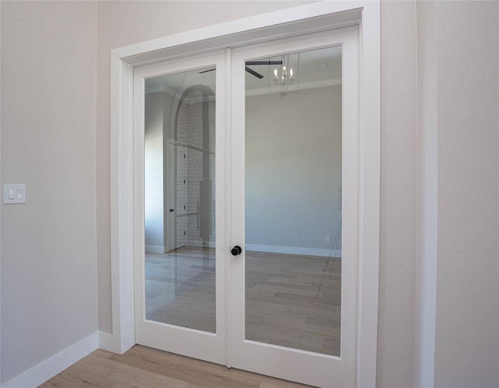 206 Knights Crossing Road, Lorena, TX 76655 Glass doors open to an office.