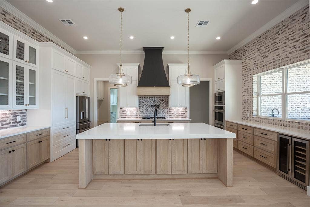 206 Knights Crossing Road, Lorena, TX 76655 Kitchen with White Oak cabinets, and a beverage fridge.