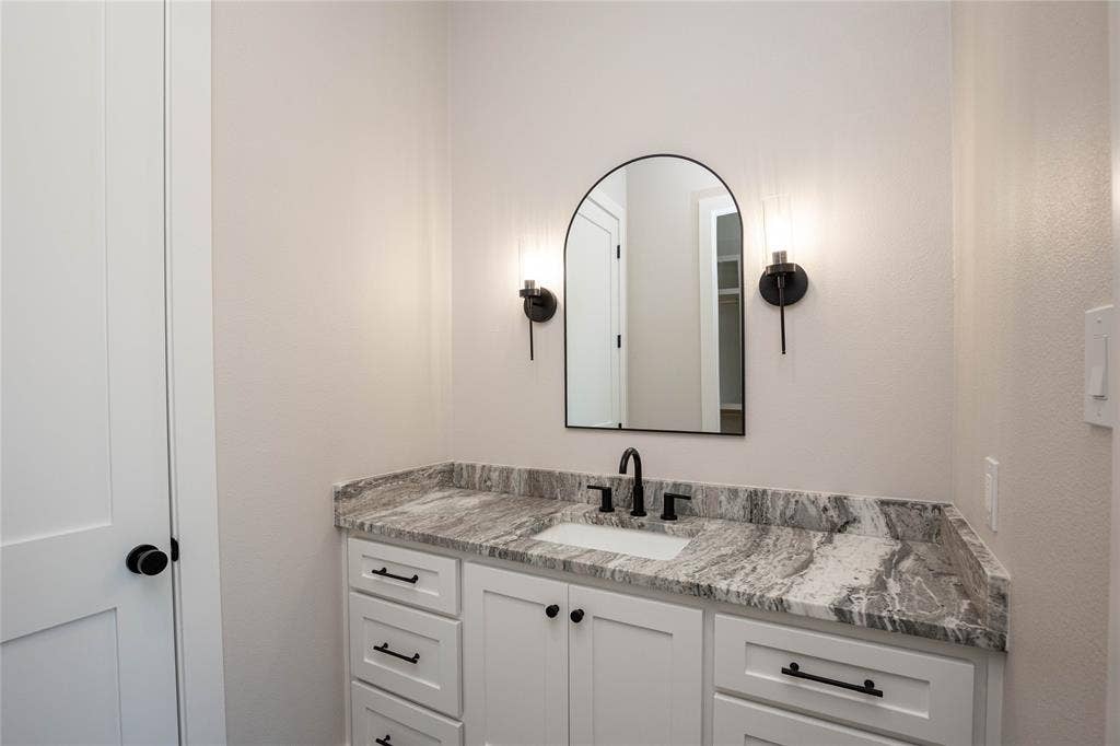 206 Knights Crossing Road, Lorena, TX 76655 This bedroom has its own sink area.