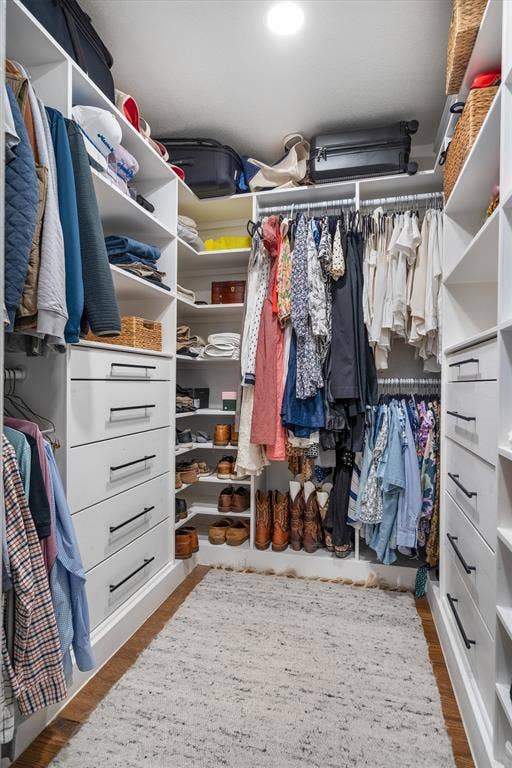 Custom closet system in the primary bedroom.