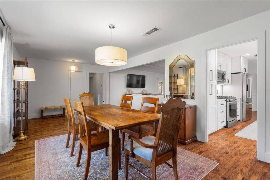 Opens up to the kitchen and living area.