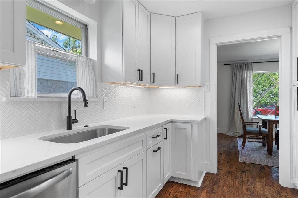 Enjoy tons of storage, gas stove, and a new fridge.