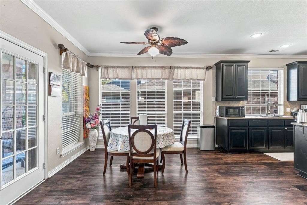 1905 Canyon Wren Drive, McKinney, TX 75071 Wood-style flooring, ceiling fan, multiple windows with blinds, and recessed lighting