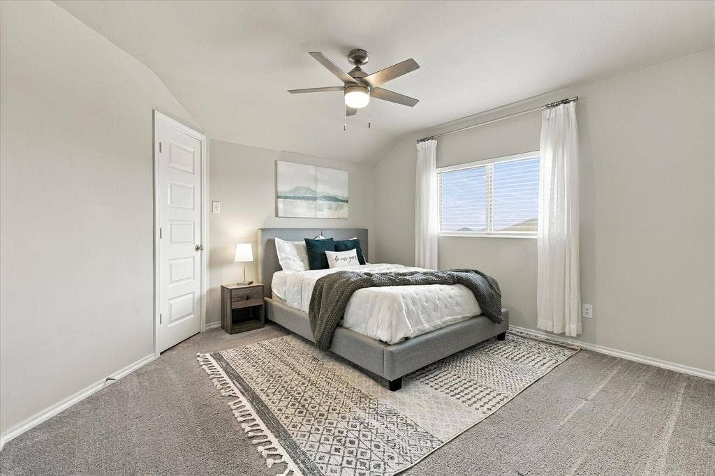 6304 Jib Court, Fort Worth, TX 76179 Recessed window with blinds, paneled door, ceiling fan with integrated lighting, and neutral wall color