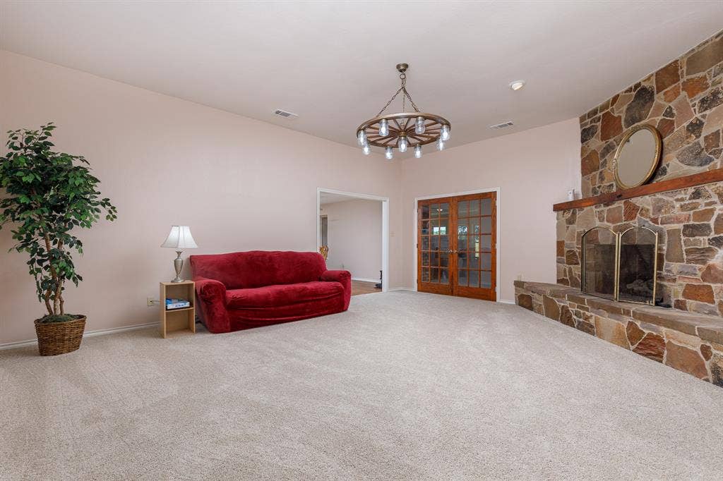 6607 S State Highway 78 Highway, Bonham, TX 75418 large living with stone fireplace