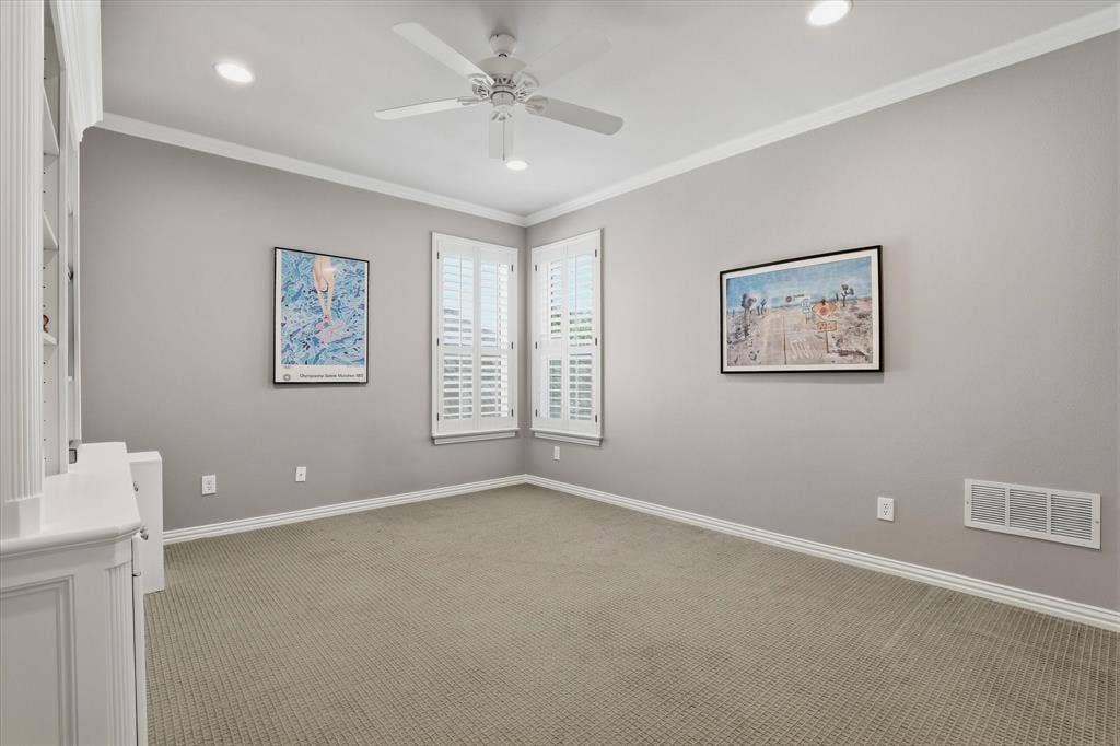 5600 Southern Hills Drive, Frisco, TX 75034 Second upstairs bedroom with built-in cabinetry offers flexibility to be an office.