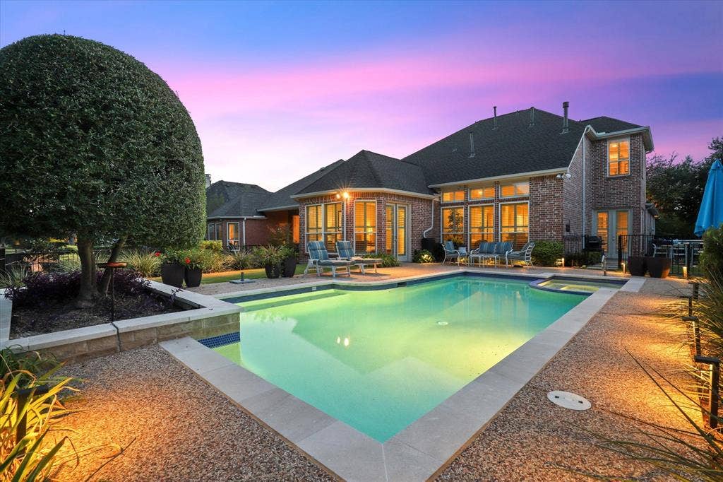 5600 Southern Hills Drive, Frisco, TX 75034 Outside, landscaped gardens surround the pool and spa, with ample patio room for dining, lounging and gathering with friends and family.