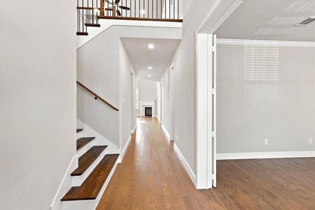 Double height dramatic foyer, with immediate access to front home office.