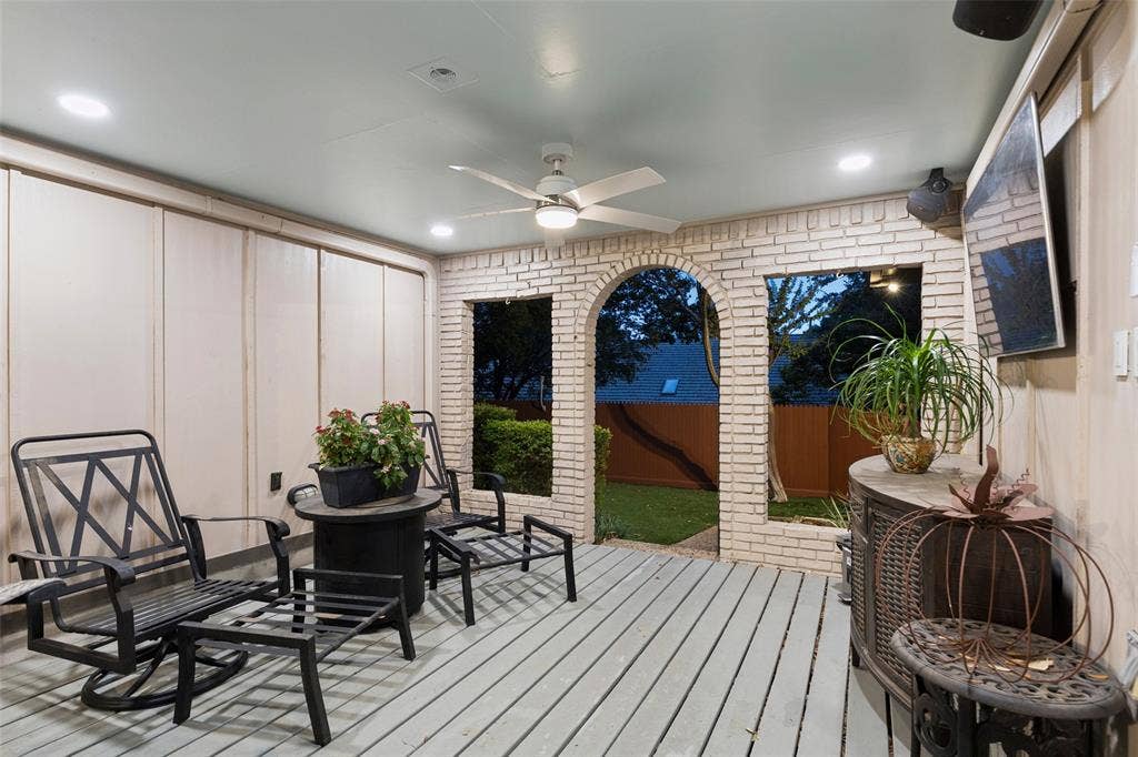 Architectural Detail in the Covered Patio — Brick arches give the covered outdoor area added character while framing views of the yard and creating a comfortable place to relax outside.
