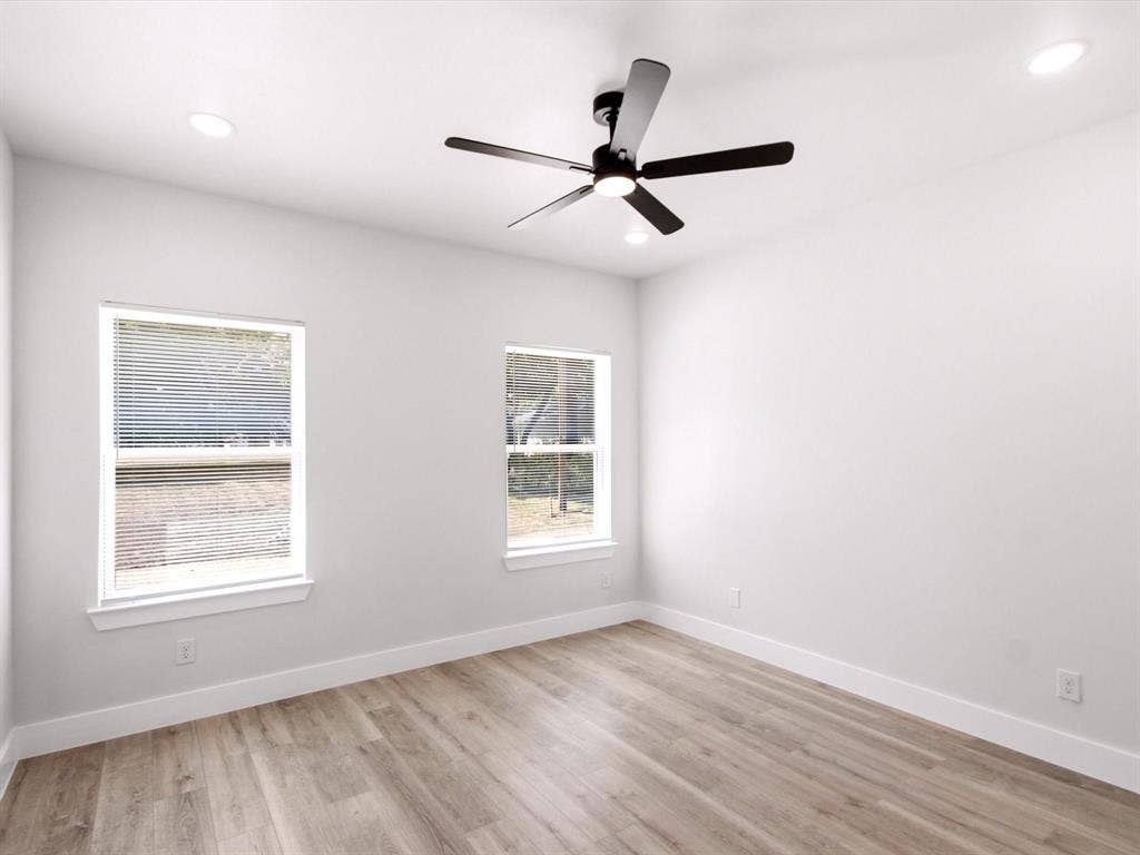 105 Oak Ridge Road, Mabank, TX 75156 Wood-finish flooring, recessed lighting, and a ceiling fan with integrated lighting