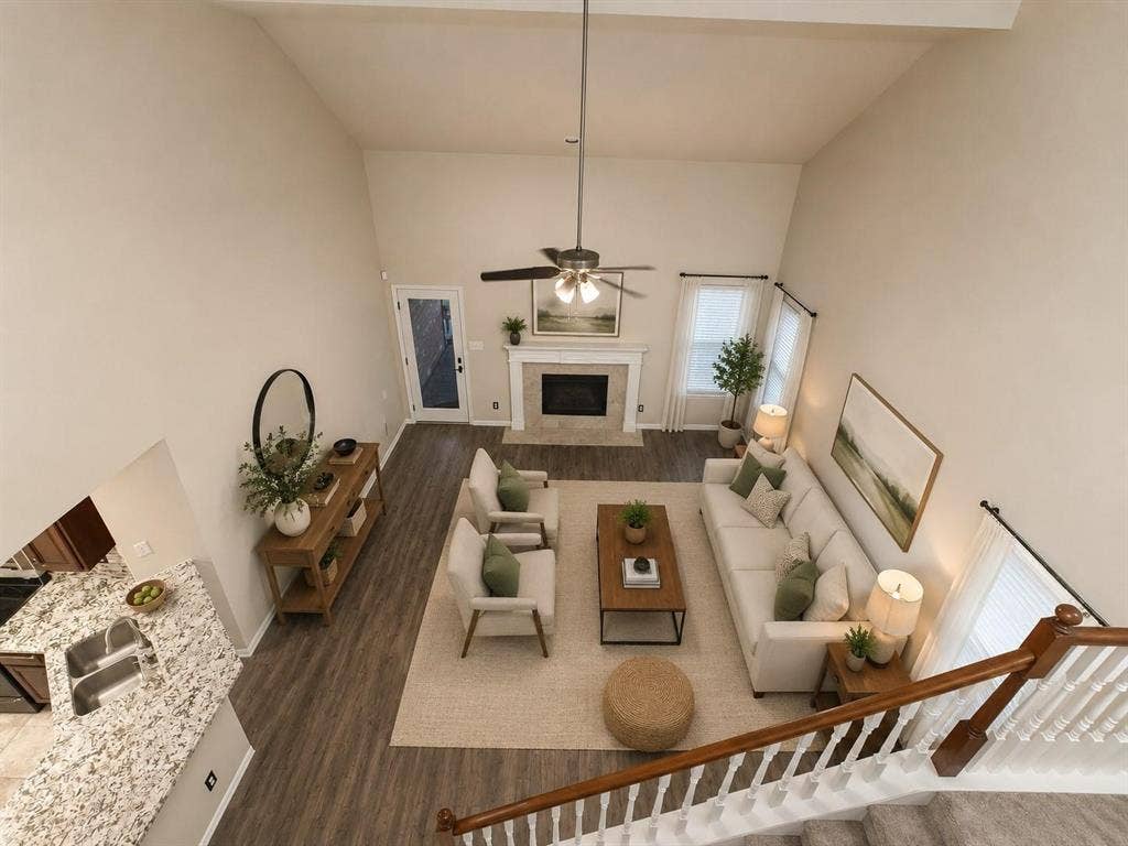 1114 Hidden Creek Drive, Allen, TX 75002 Vaulted ceilings highlight the spacious living area with wood-finish flooring