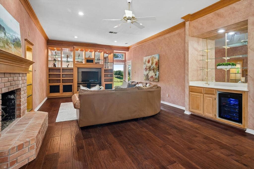 2204 Creekside Circle S, Irving, TX 75063 Gorgeous floors set off this room made for viewing TV with little glare, complete with a wet bar or beverage center.