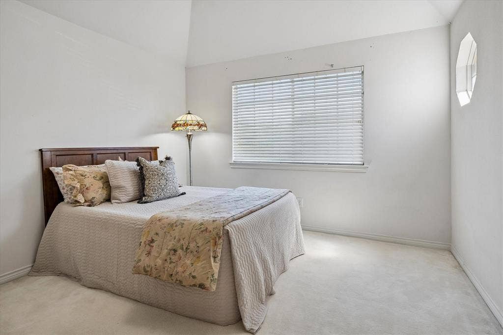 2204 Creekside Circle S, Irving, TX 75063 Second guest room up with cushioned ceiling, extra octagonal window to golf views, walk in closet and en suite bath