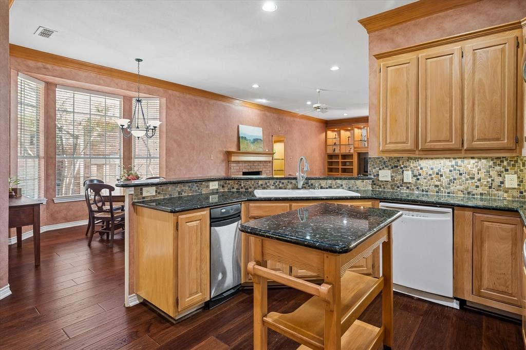 2204 Creekside Circle S, Irving, TX 75063 Also includes a trash compactor, open viewing to dining and den, and a walk in pantry!