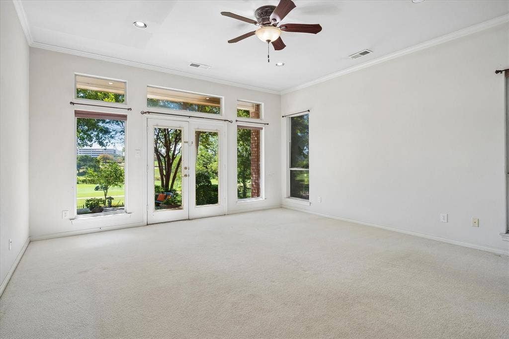 2204 Creekside Circle S, Irving, TX 75063 Dual glass French doors, transom windows, recessed lighting, ceiling fan, and crown molding with amazing views of country club and city scape