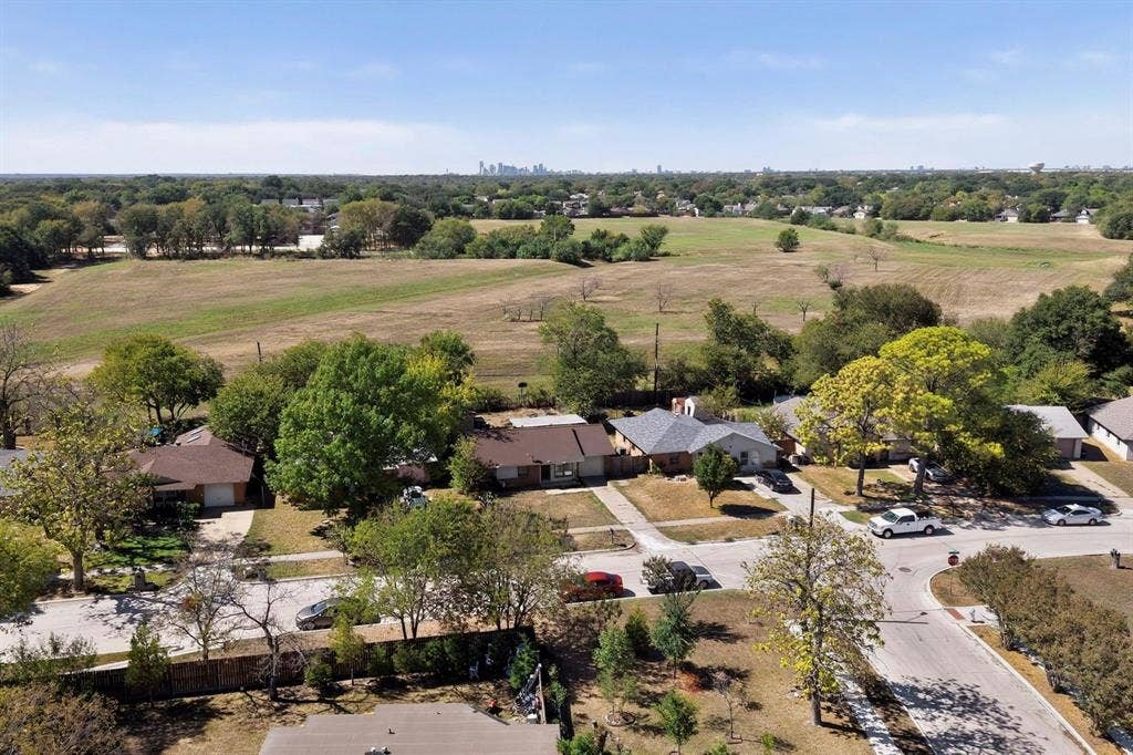 Residential setting with mature trees and established homes
