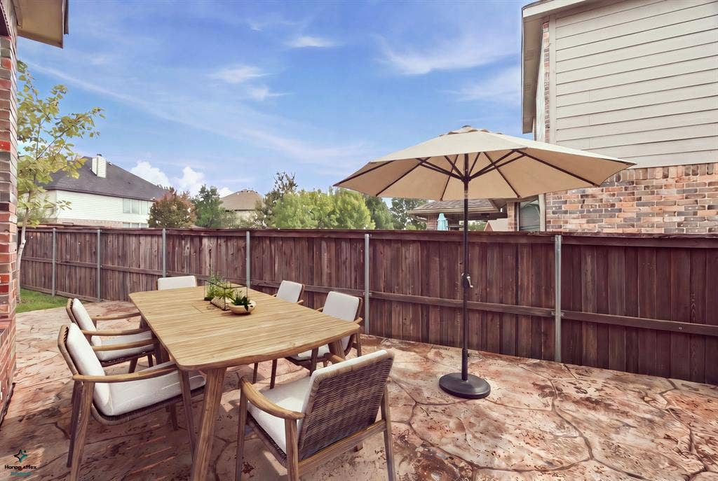 4220 Boxwood Drive, Denton, TX 76208 Virtually staged to show the possibilities. There is ample space for tables and chairs