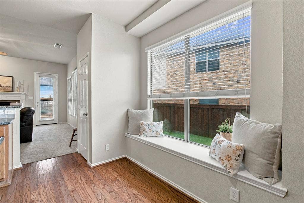 4220 Boxwood Drive, Denton, TX 76208 Cozy built in bench in the kitchen. You can add a table for an extra breakfast nook.