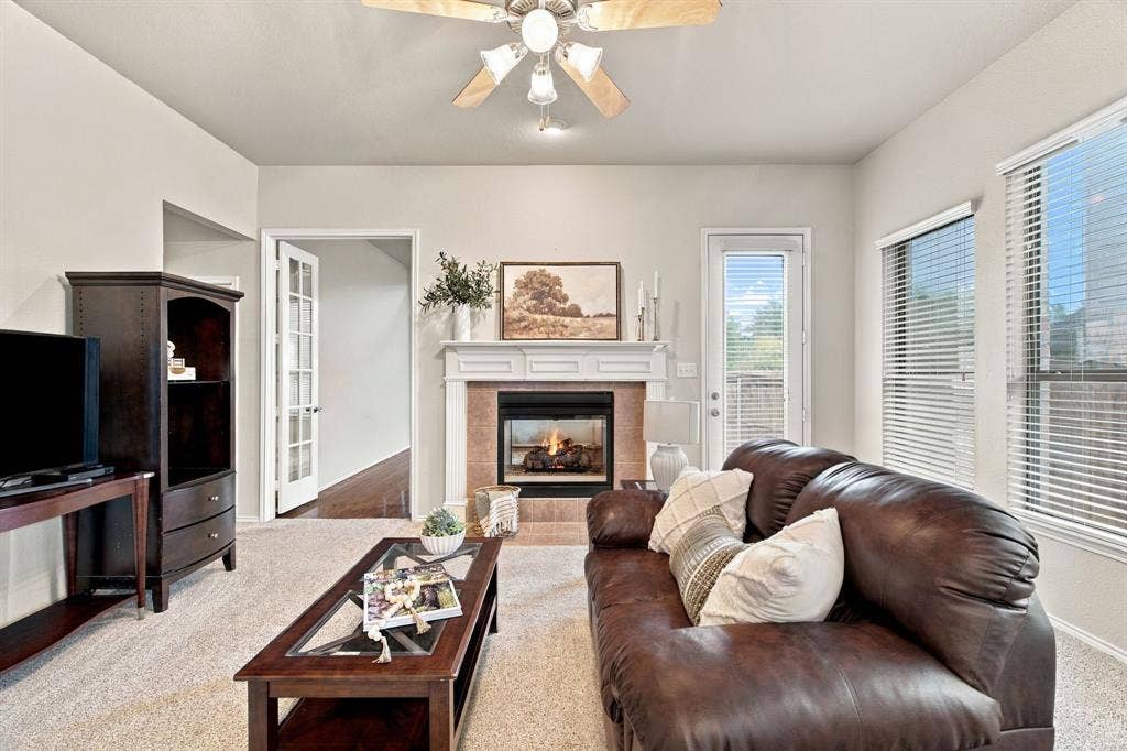 4220 Boxwood Drive, Denton, TX 76208 Large windows along the wall and a nice glass patio door for extra light.