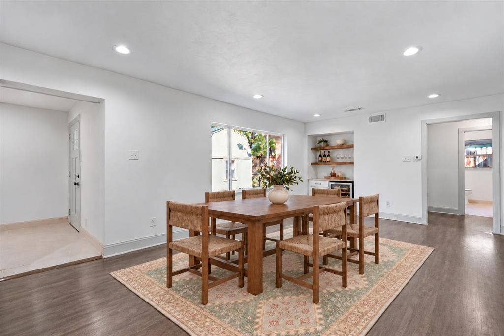 Virtually staged dining area and dry bar