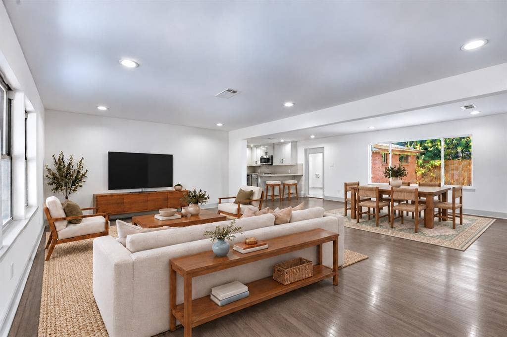 Virtually staged living and dining area