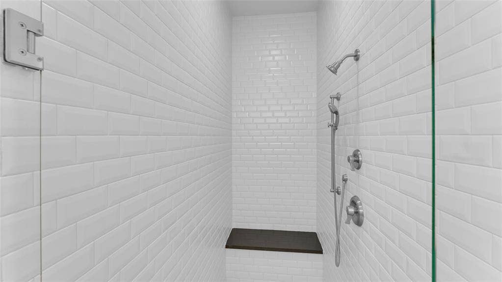 5925 Mayhew Court, McKinney, TX 75070 Frameless shower door and shower hardware set.