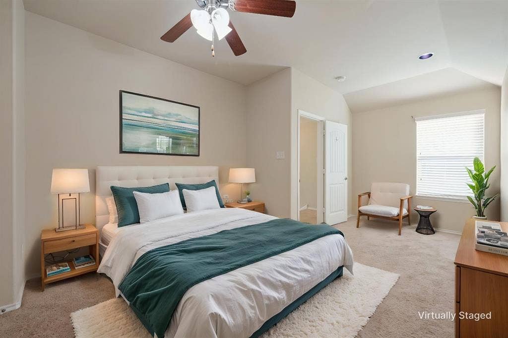 9801 Moccasin Creek Lane, McKinney, TX 75071 Carpeted flooring, vaulted ceiling, recessed lighting, ceiling fan, and window with blinds