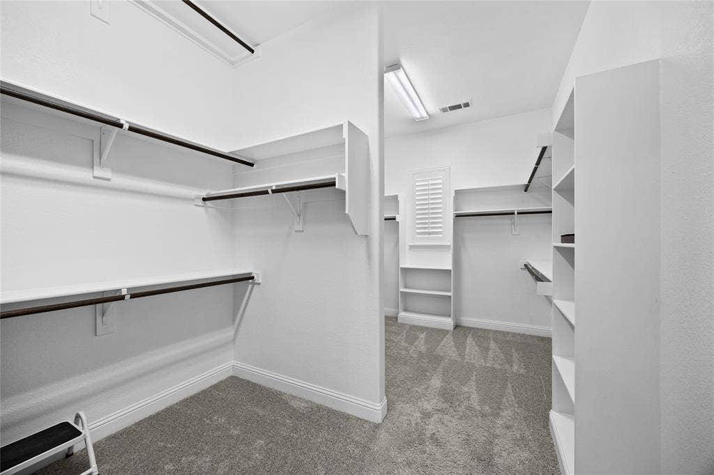 Main primary oversized walk in closet