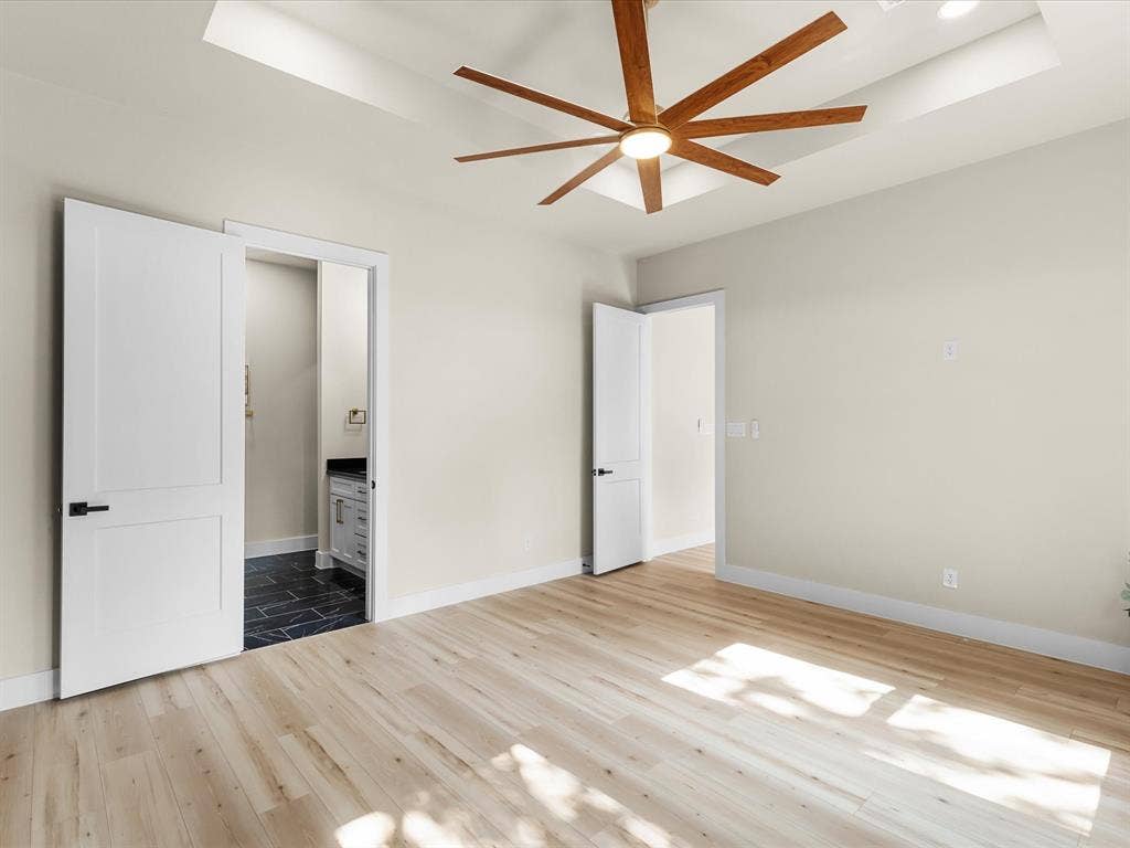 2127 Amanda Avenue, Fort Worth, TX 76105 Tray ceiling featuring a contemporary ceiling fan with integrated lighting