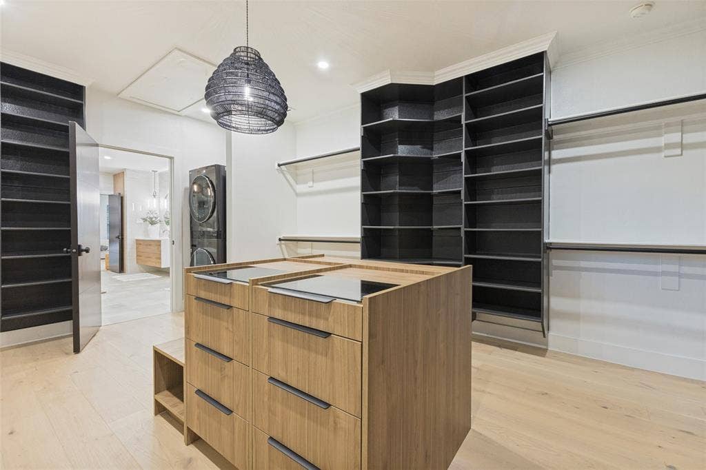 4624 Willow Lane, Dallas, TX 75244 Primary closet with stackable with convenient stackable W/D