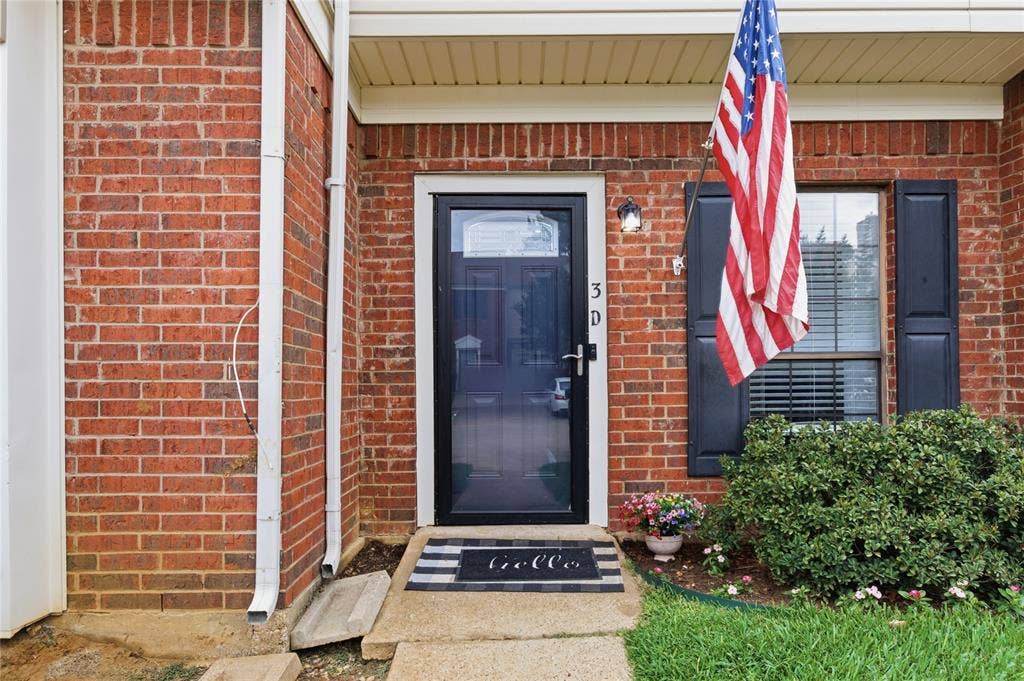 212 Samuel Boulevard, #3, Coppell, TX 75019 Brick exterior with a storm door entry