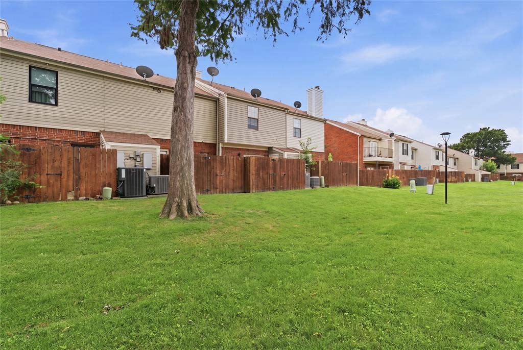 212 Samuel Boulevard, #3, Coppell, TX 75019 Expansive green space featuring a mature tree