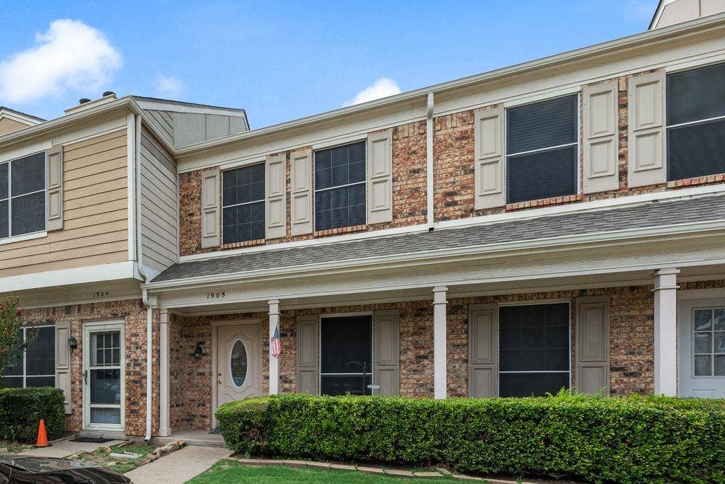 3801 14th Street, #1905, Plano, TX 75074 Brick and siding exterior with a covered porch entry