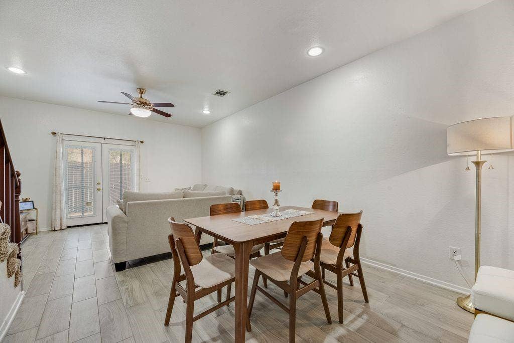 3801 14th Street, #1905, Plano, TX 75074 Recessed lighting, ceiling fan, wood-finish flooring, and French doors