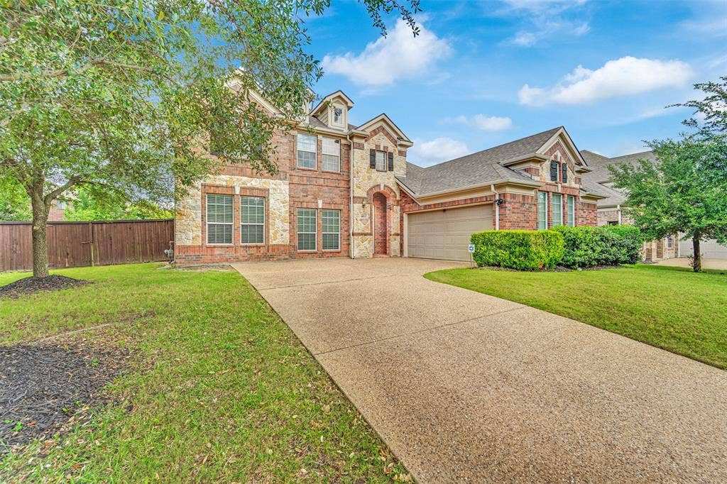 6811 Shady View Court, Sachse, TX 75048 Brick and stone facade with multiple gables