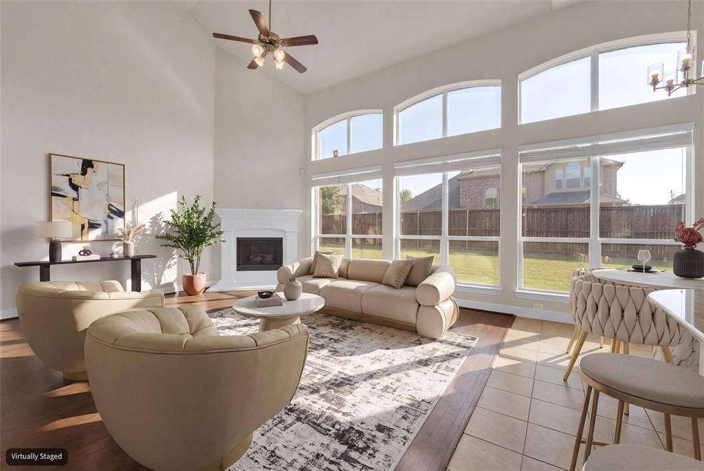 6811 Shady View Court, Sachse, TX 75048 Vaulted ceiling, arched windows, wood-finish flooring, tiled flooring, fireplace with mantel
